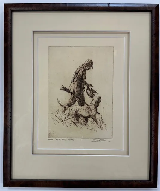 A sepia etching of a hunter and dog, in a walnut burl frame with white double mats separated by a spacer