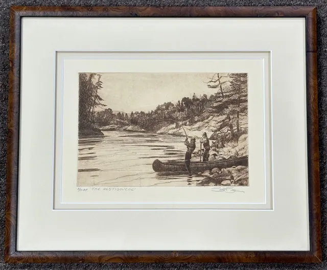 A sepia etching of anglers on a river, in a walnut burl frame with wide white double mats